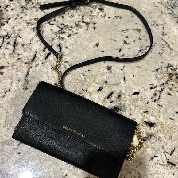 black michael kors cross body clutch